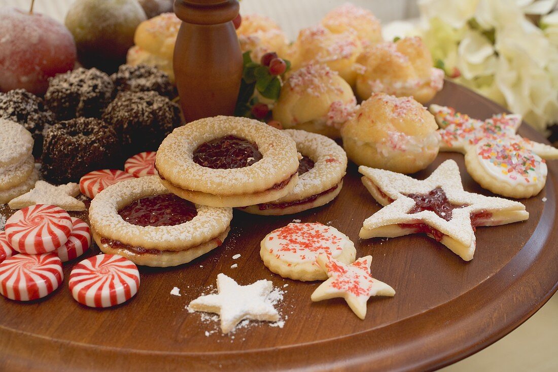 Christmas biscuits and mint sweets on tiered stand