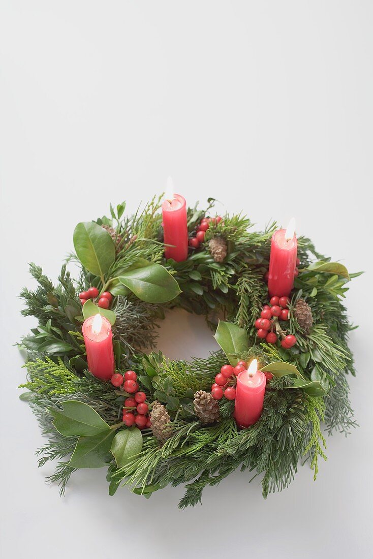 Advent wreath with four burning candles