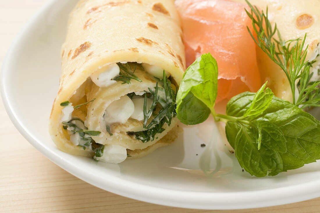 Pancake with soft cheese, smoked salmon and herbs