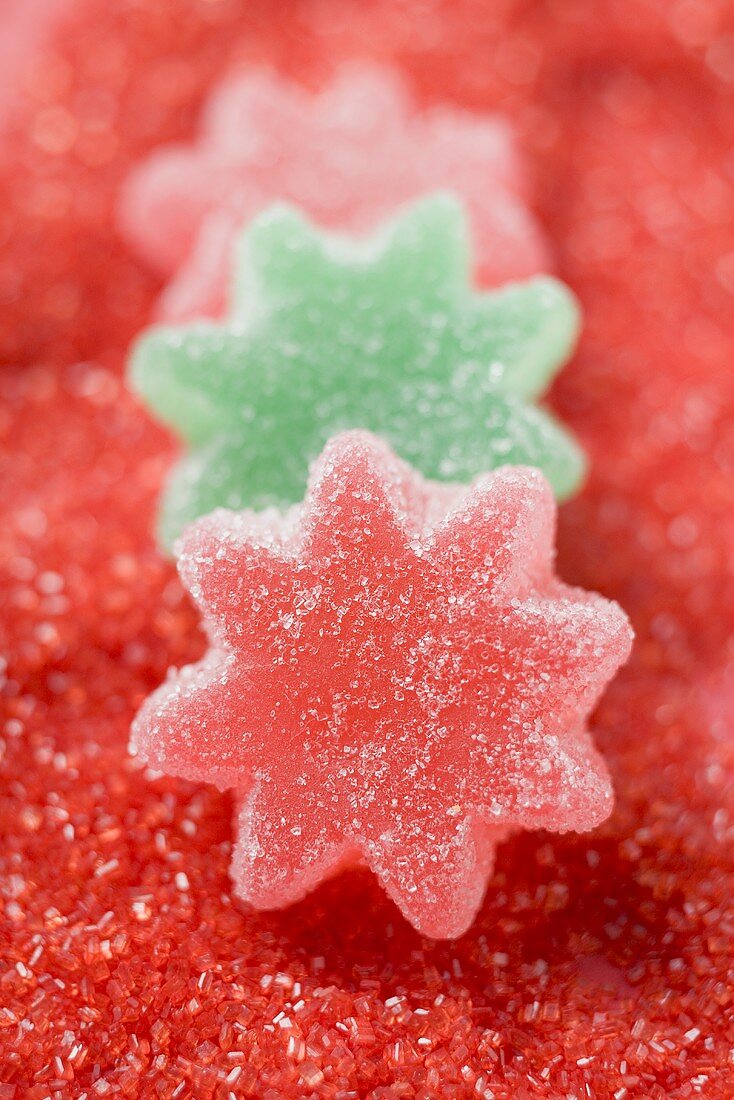 Jelly stars on red sugar