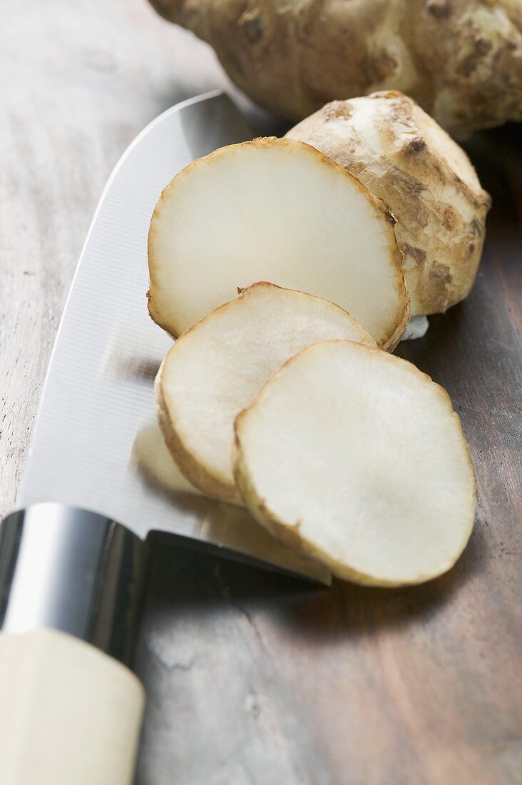 Fresh ginger root, partly sliced