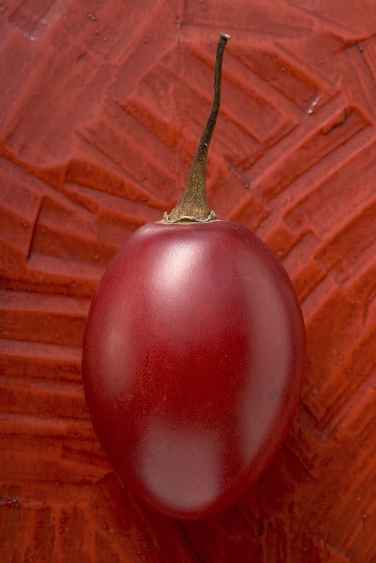 Whole tamarillo