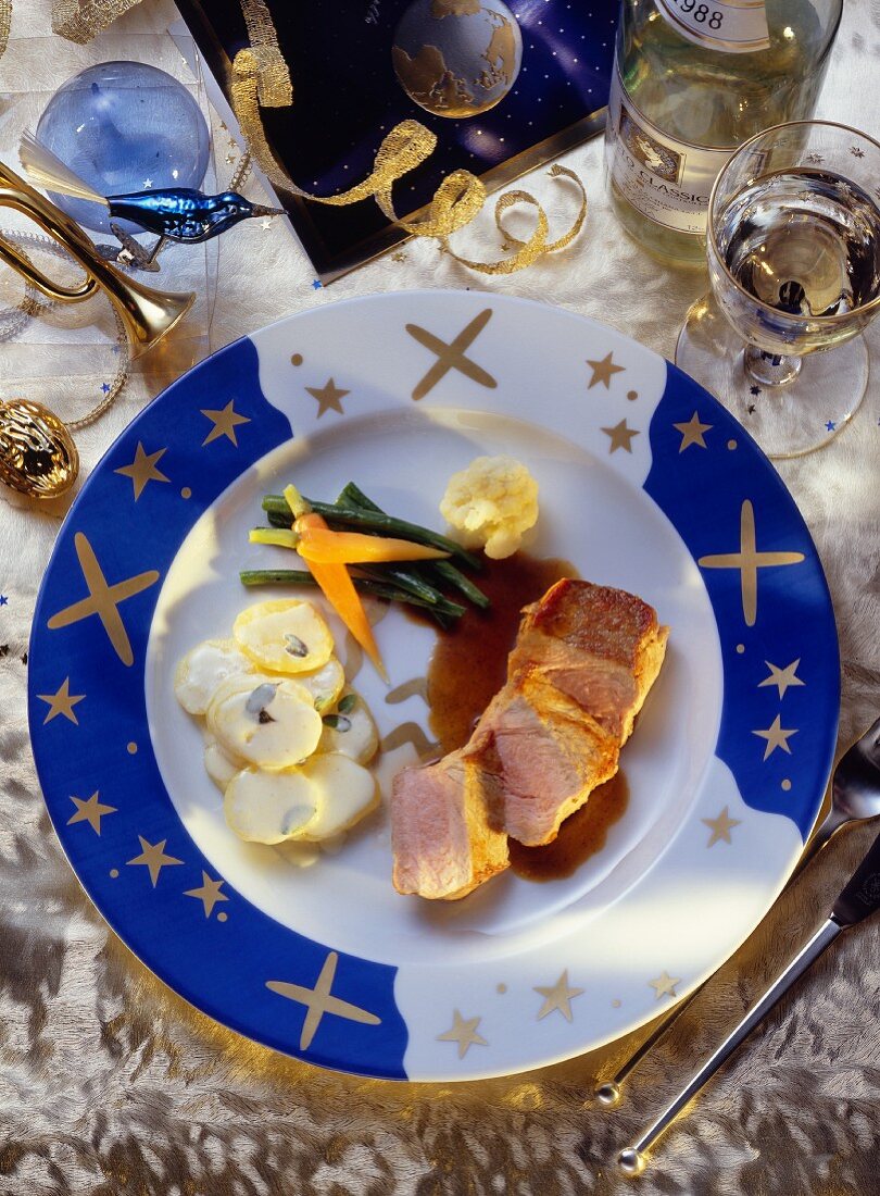 Pork fillet; Bechamel potatoes; Vegetables