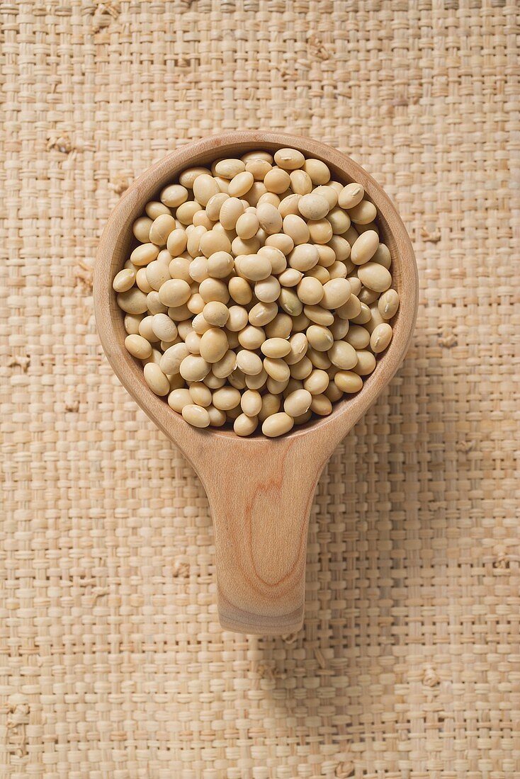 Soya beans in a small wooden bowl