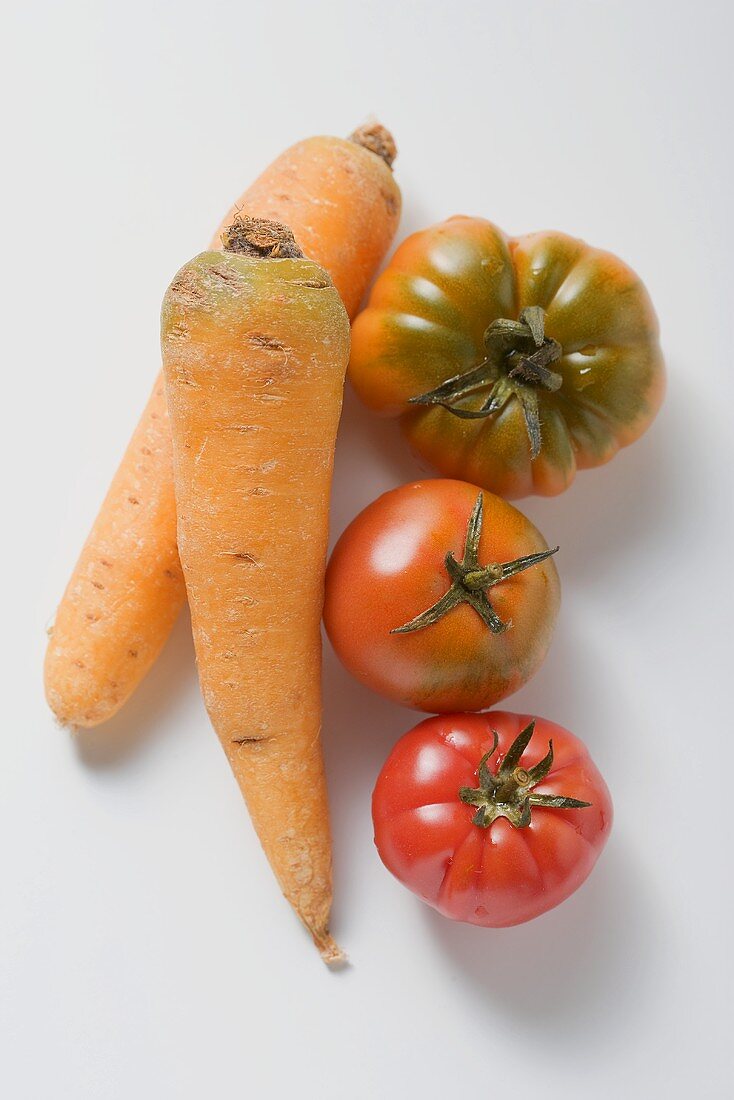 Two carrots and three tomatoes