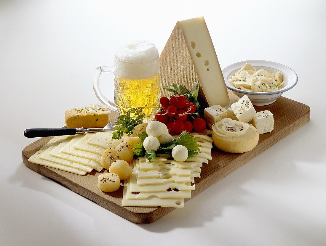 Bavarian cheese board with radishes and beer