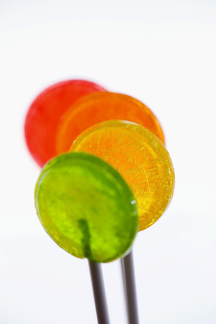 Four coloured lollipops