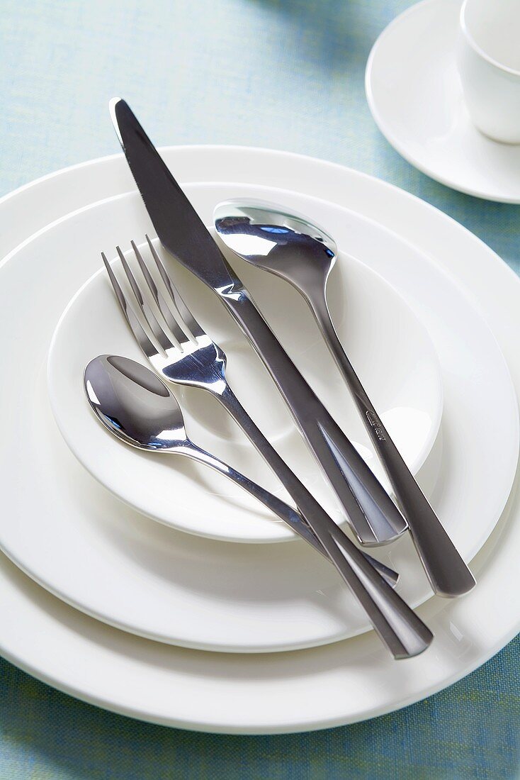White plates and cutlery