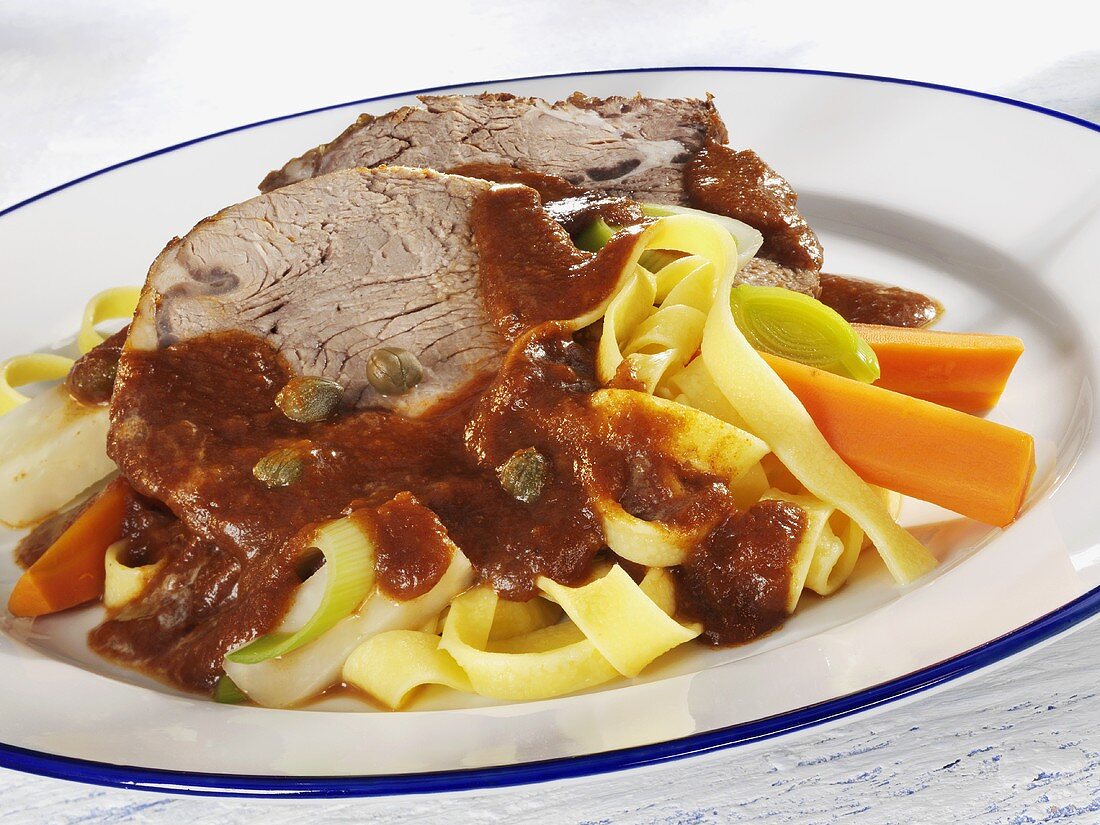 Pot roast beef with ribbon pasta and vegetables