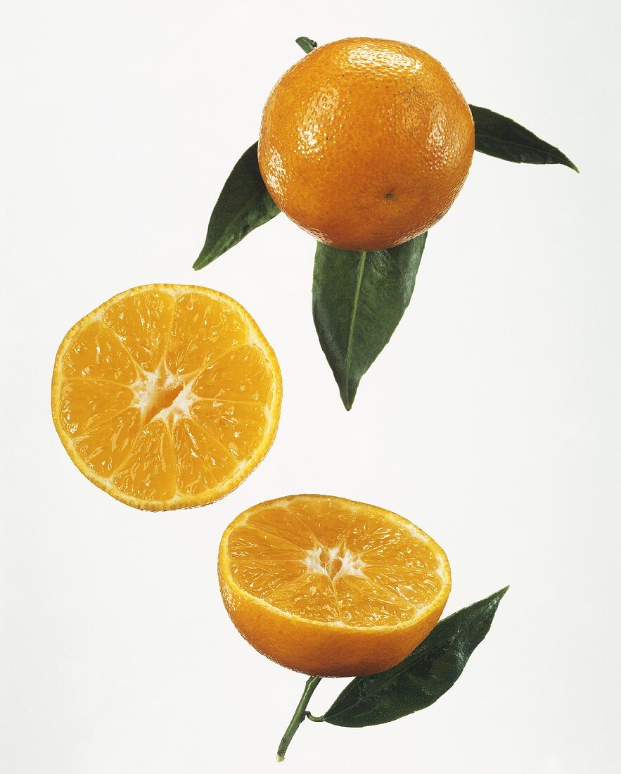 Whole clementine and halved clementine
