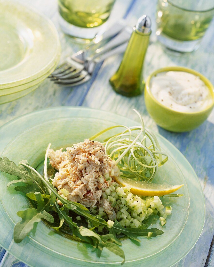 Stockfischpüree mit Gurken und Rucola