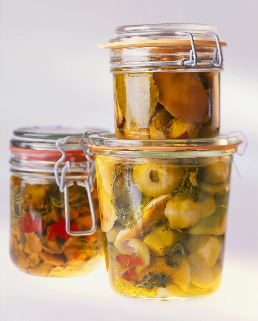 Pickled vegetables in three jars