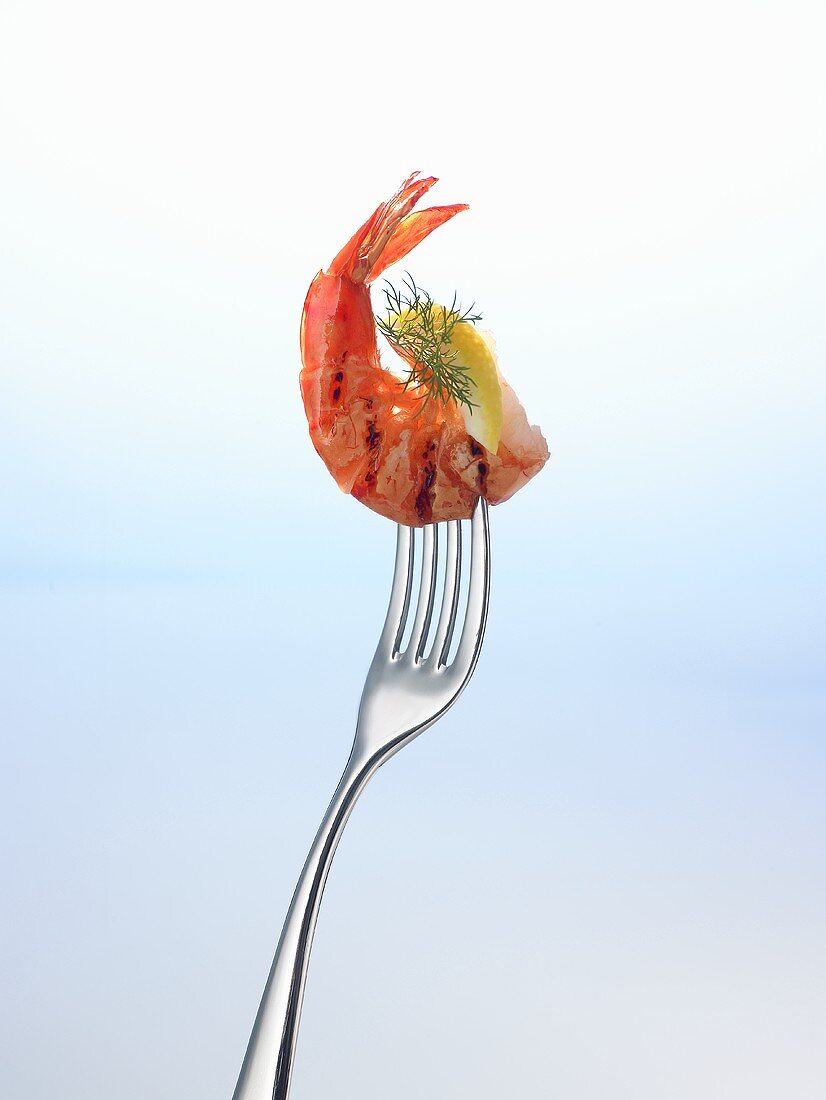 Grilled prawn on a fork