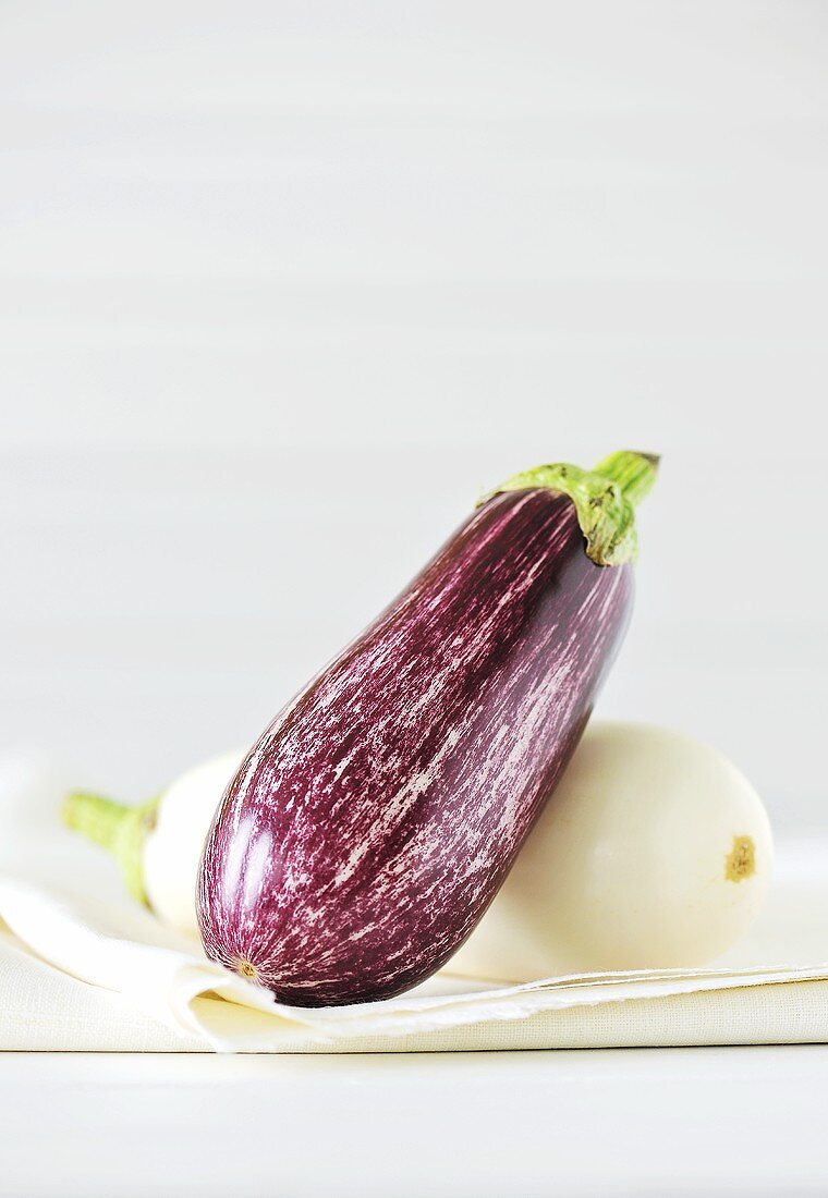 Two aubergines (purple and white)