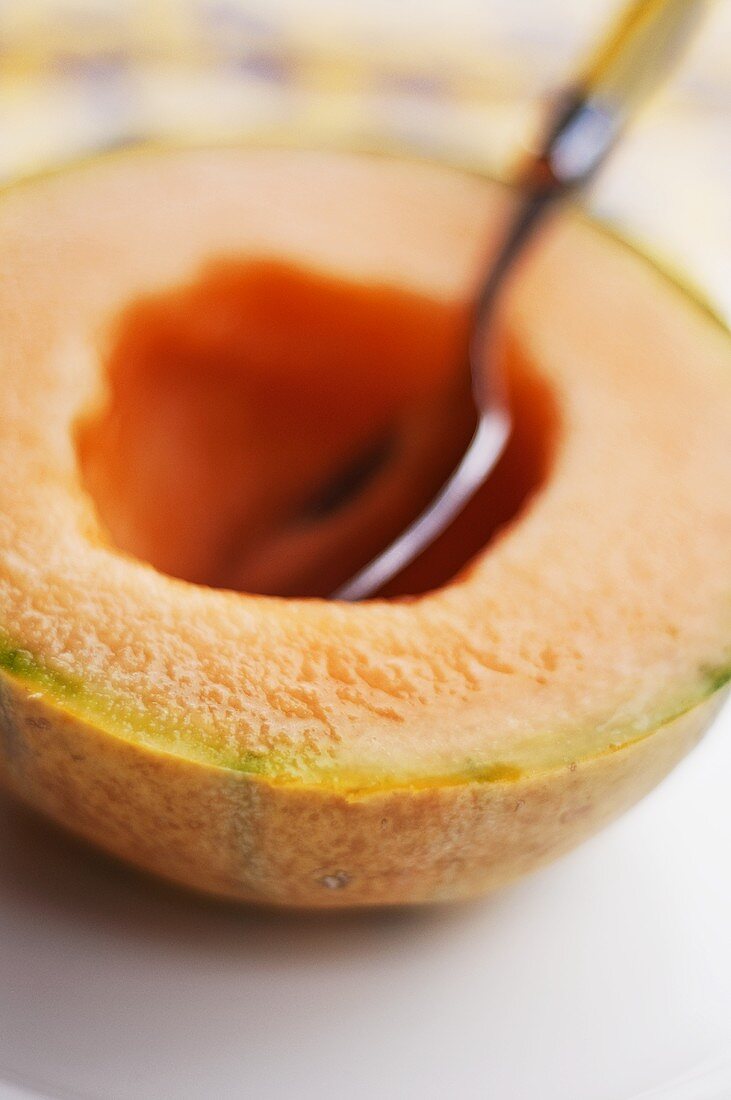 A hollowed-out cantaloupe melon