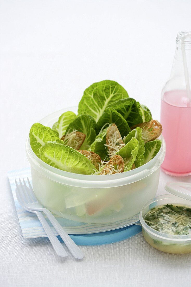 Caesar salad and lemonade for lunch