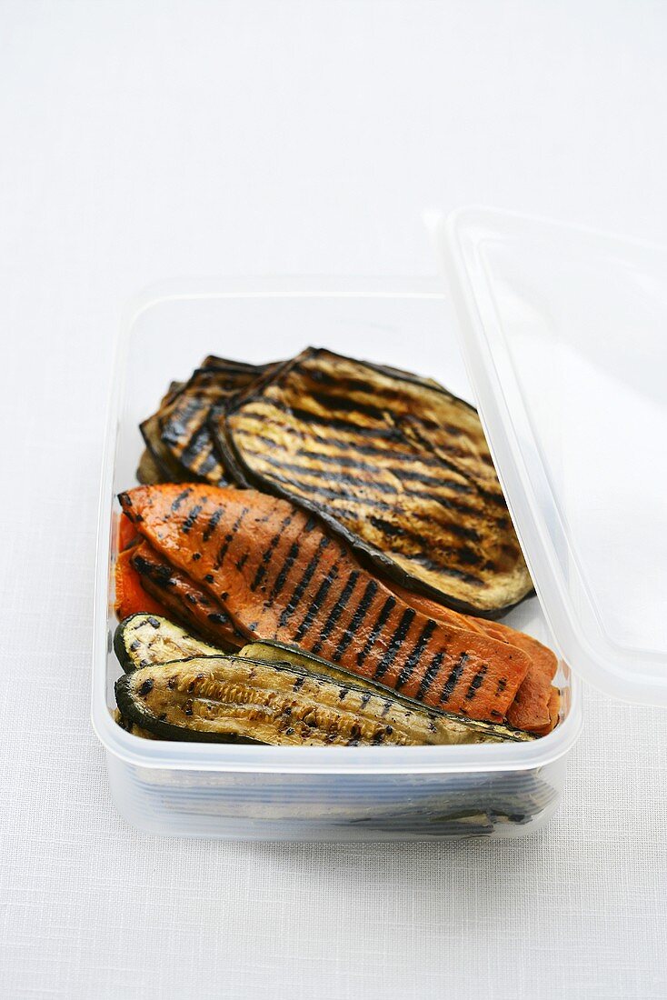 Grilled vegetables in a plastic box