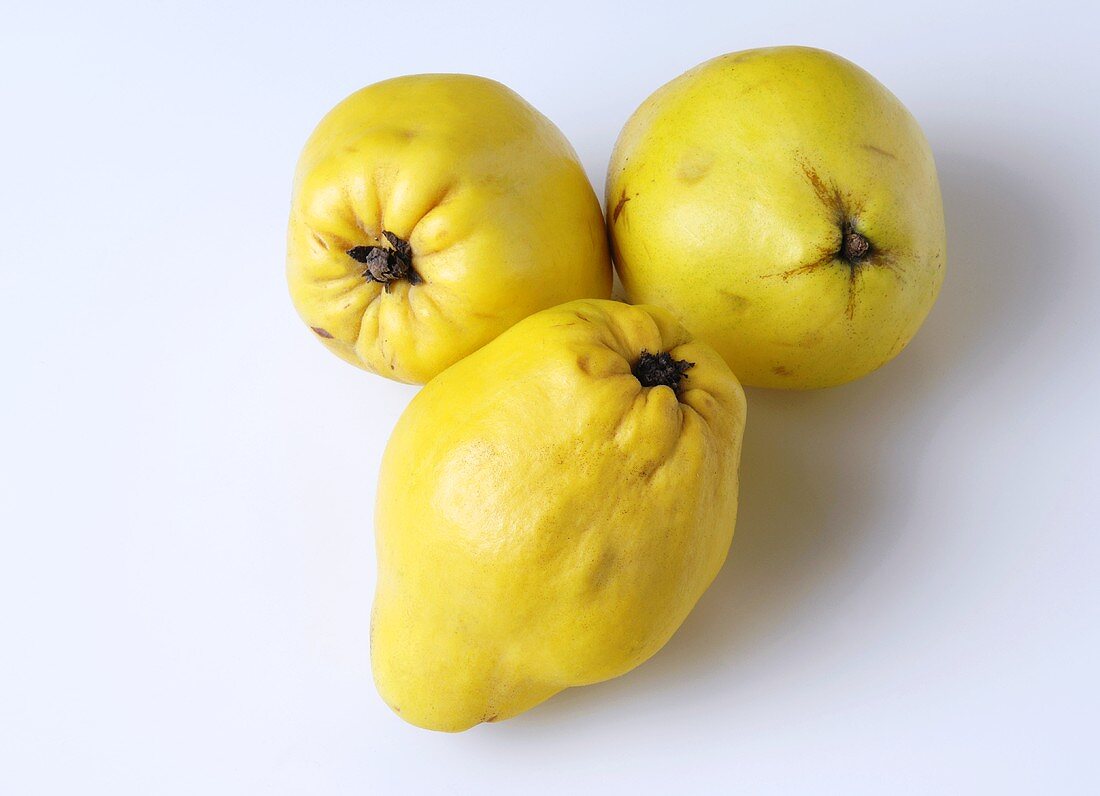 Three whole quinces