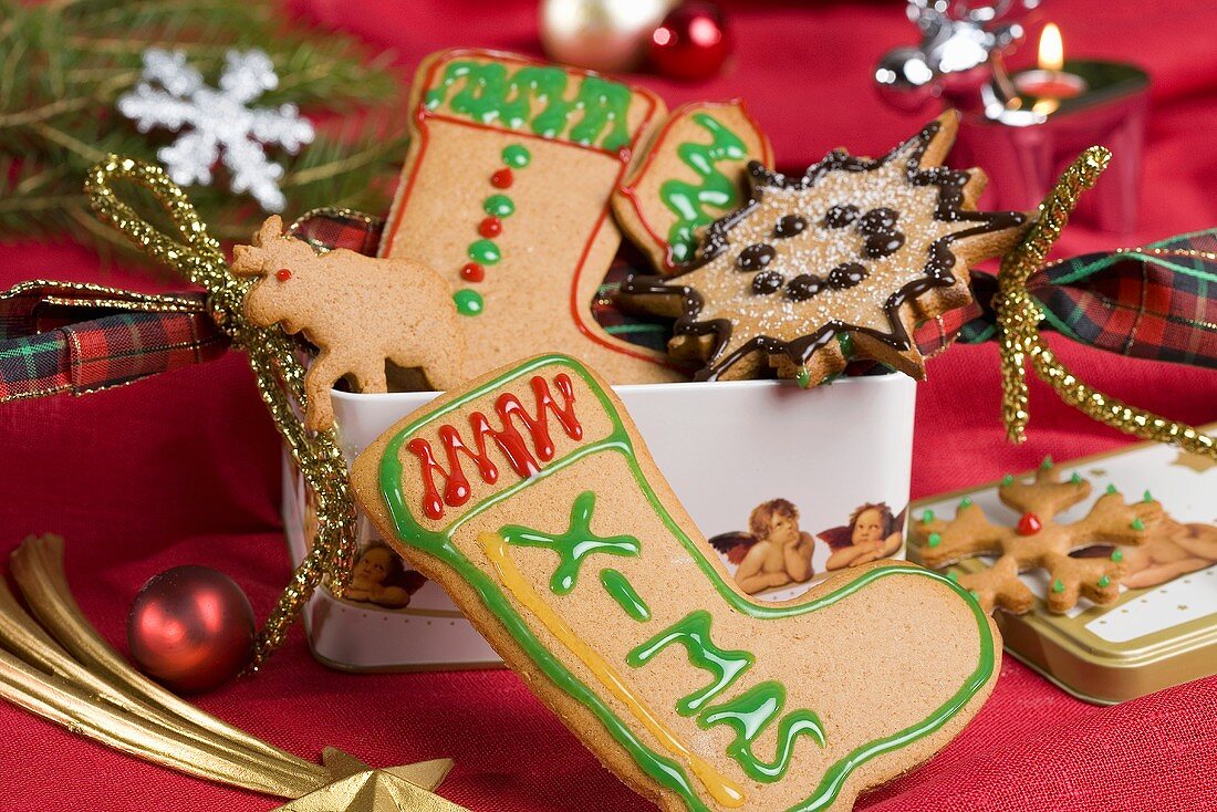Various Christmas biscuits in a biscuit tin