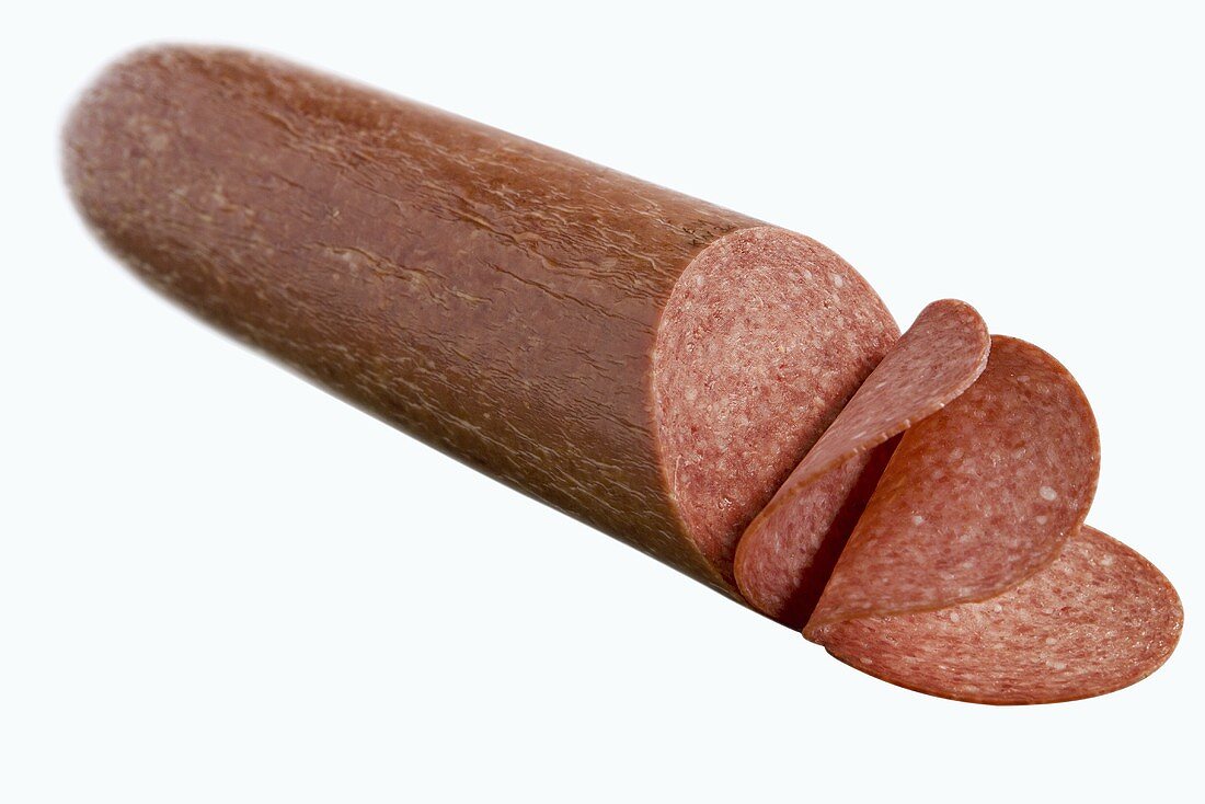 Partially Sliced Salami; White Background