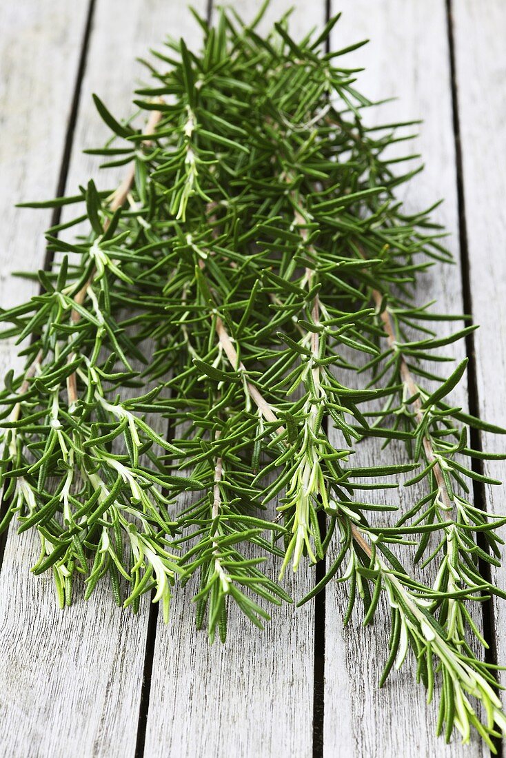 Fresh rosemary on a wooden table