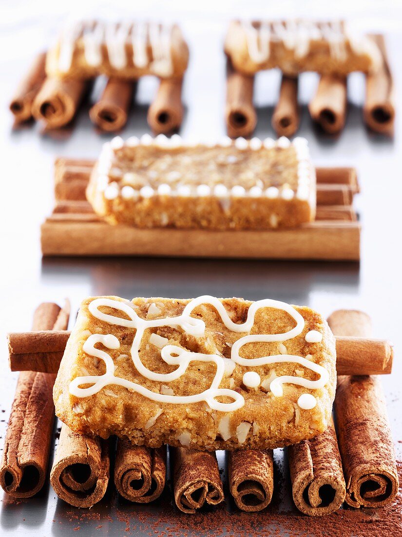 French 'pepper nut' biscuits on cinnamon sticks
