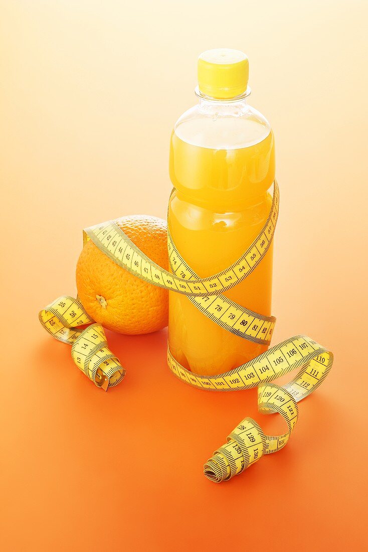 Orange juice and a tape measure