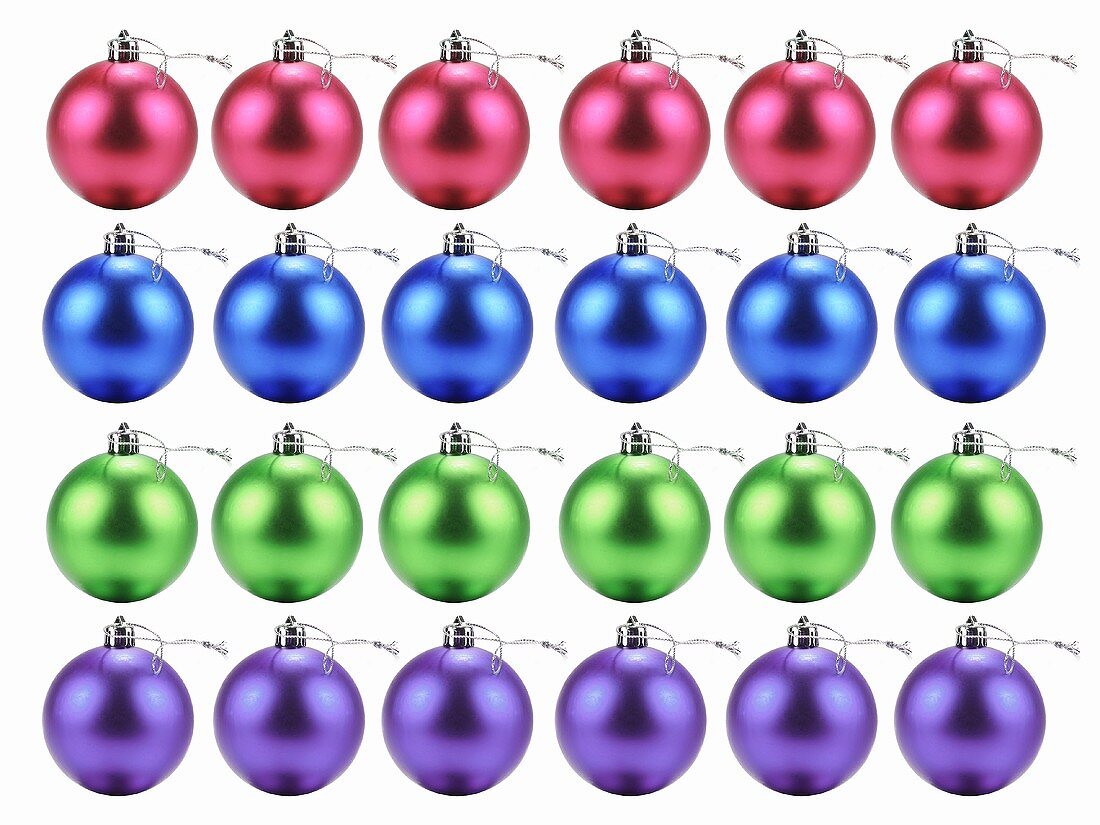 Lots of Christmas baubles in rows