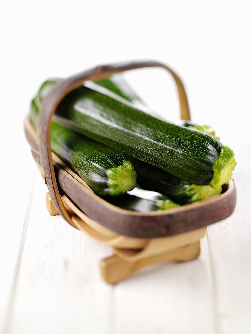 Courgettes in a small basket