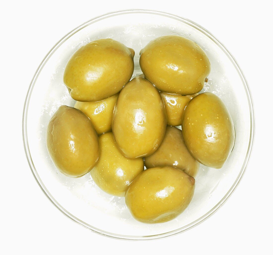 Green olives in a small bowl