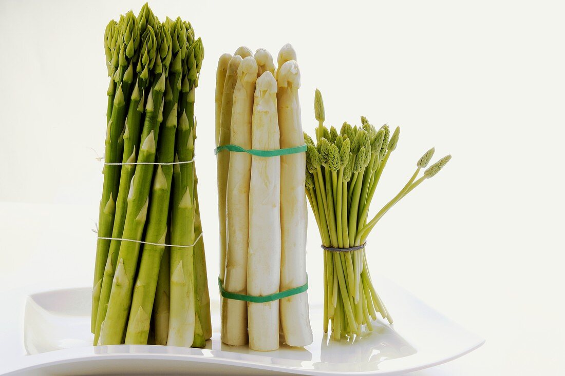 Three sorts of asparagus (green, white and wild)