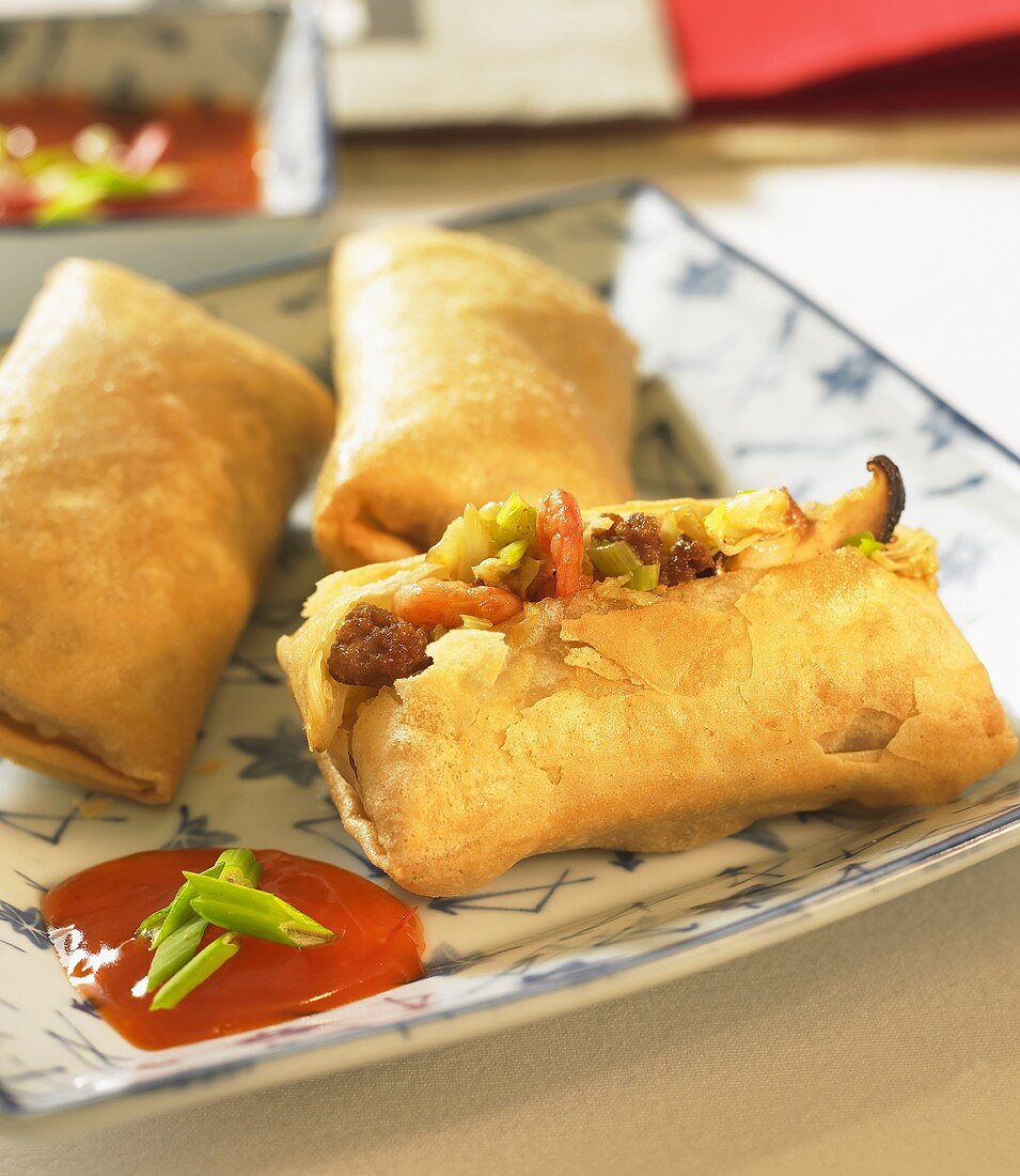 Spring rolls on Chinese tableware