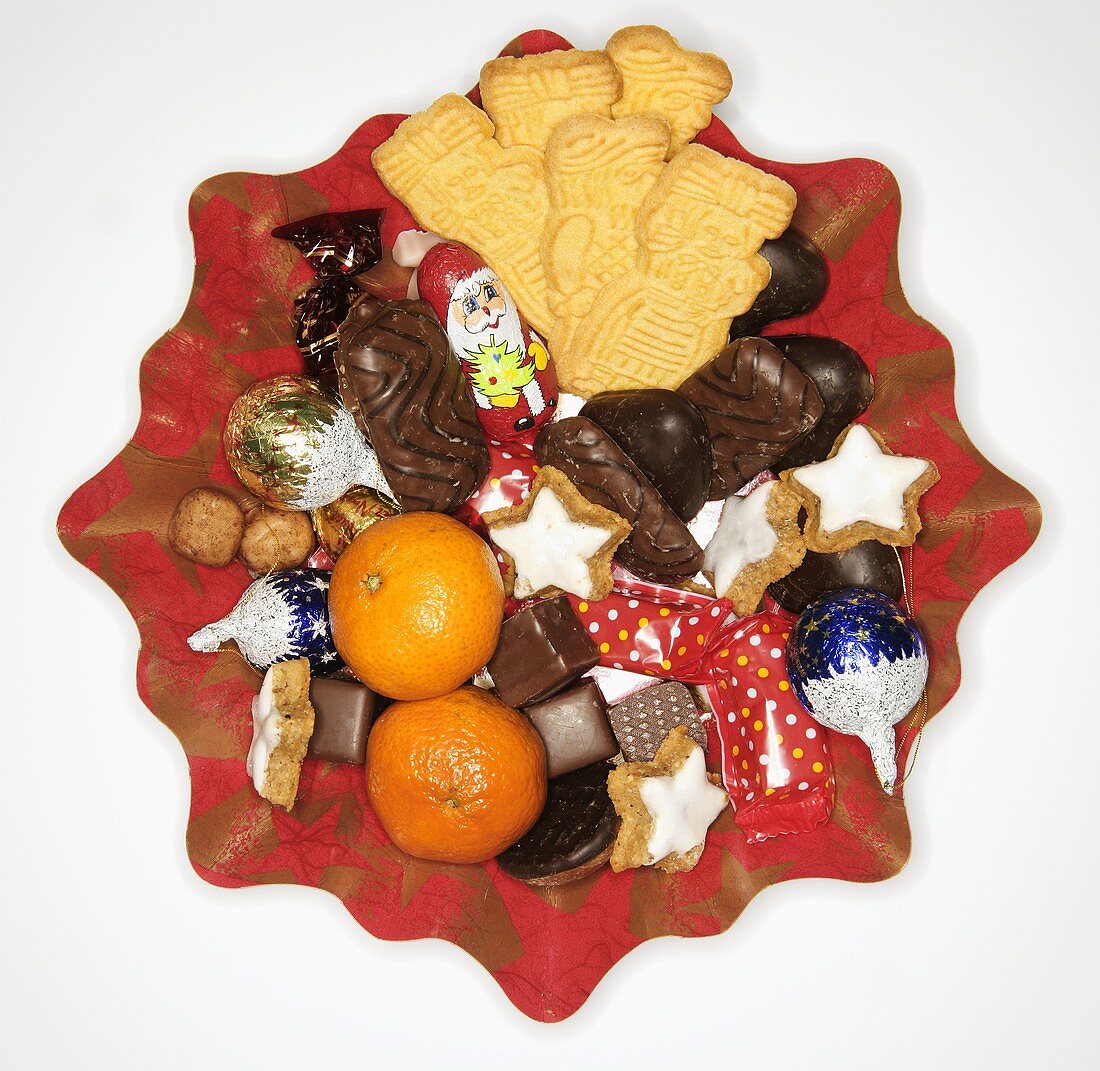 Biscuit plate with Christmas cookies and mandarin oranges