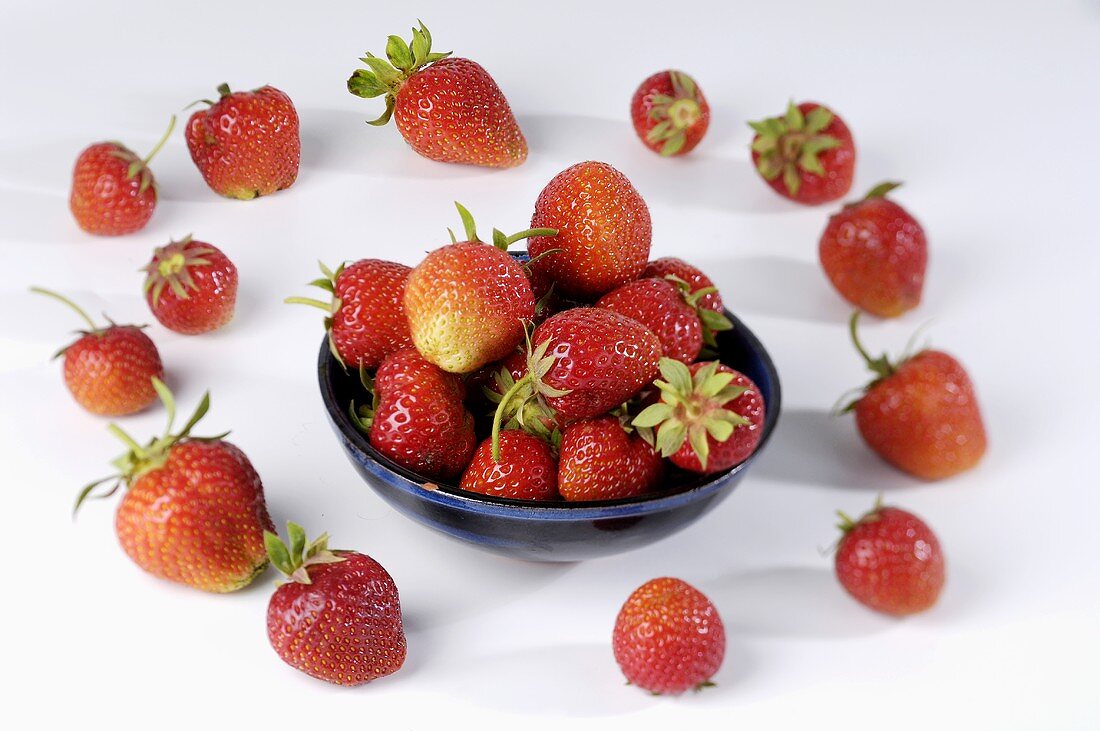 Strawberries and beside a small bowl