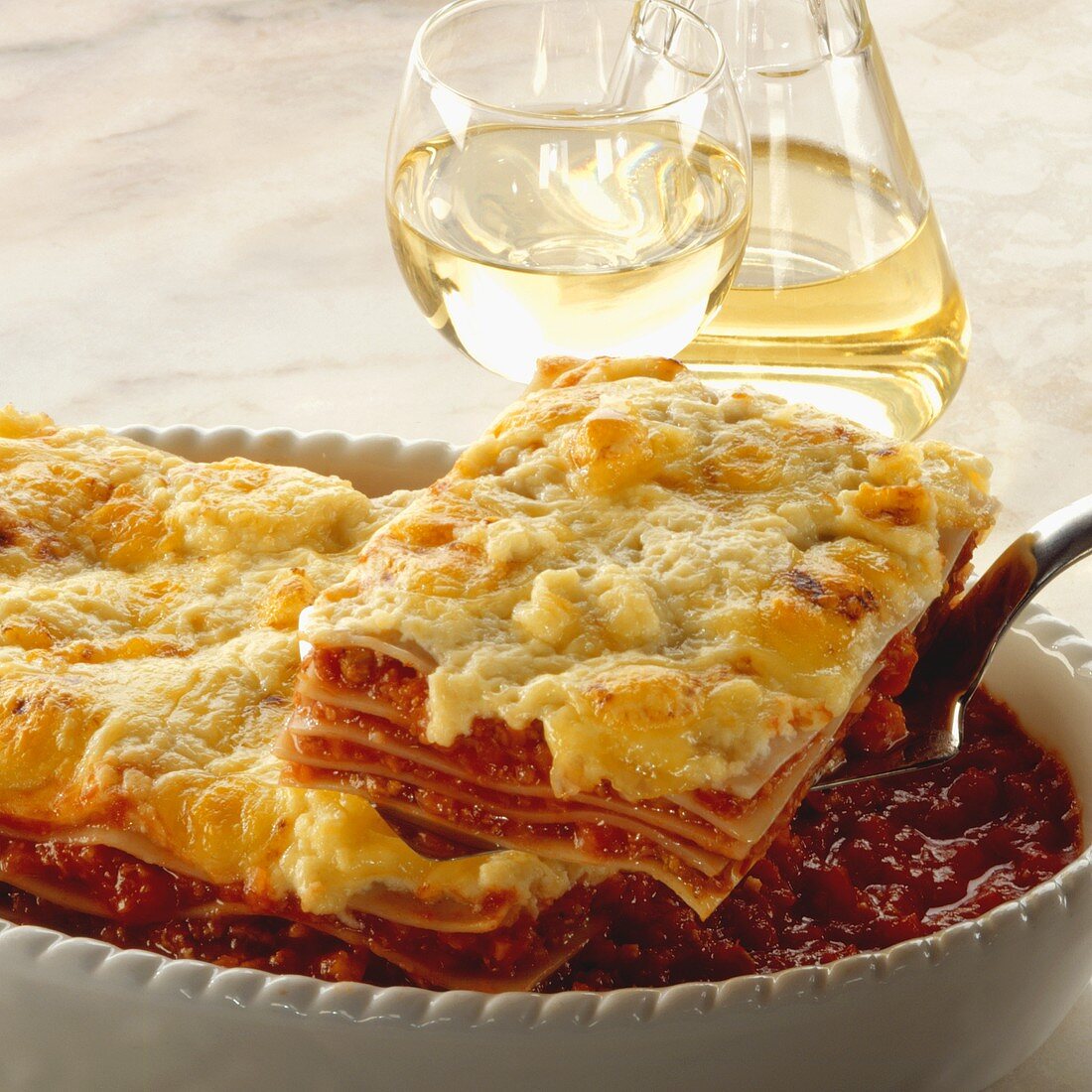 A Serving of Lasagne with White Wine