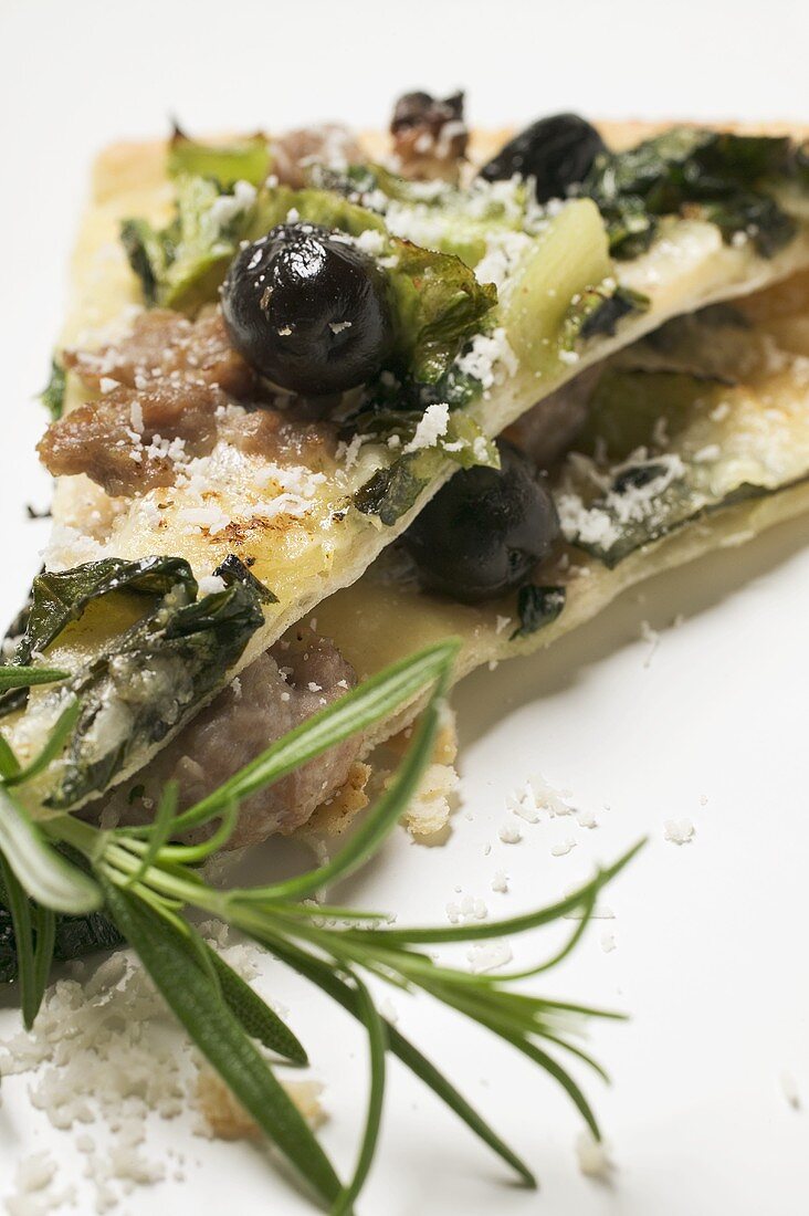 Flatbread with olives, mince, chard and Parmesan