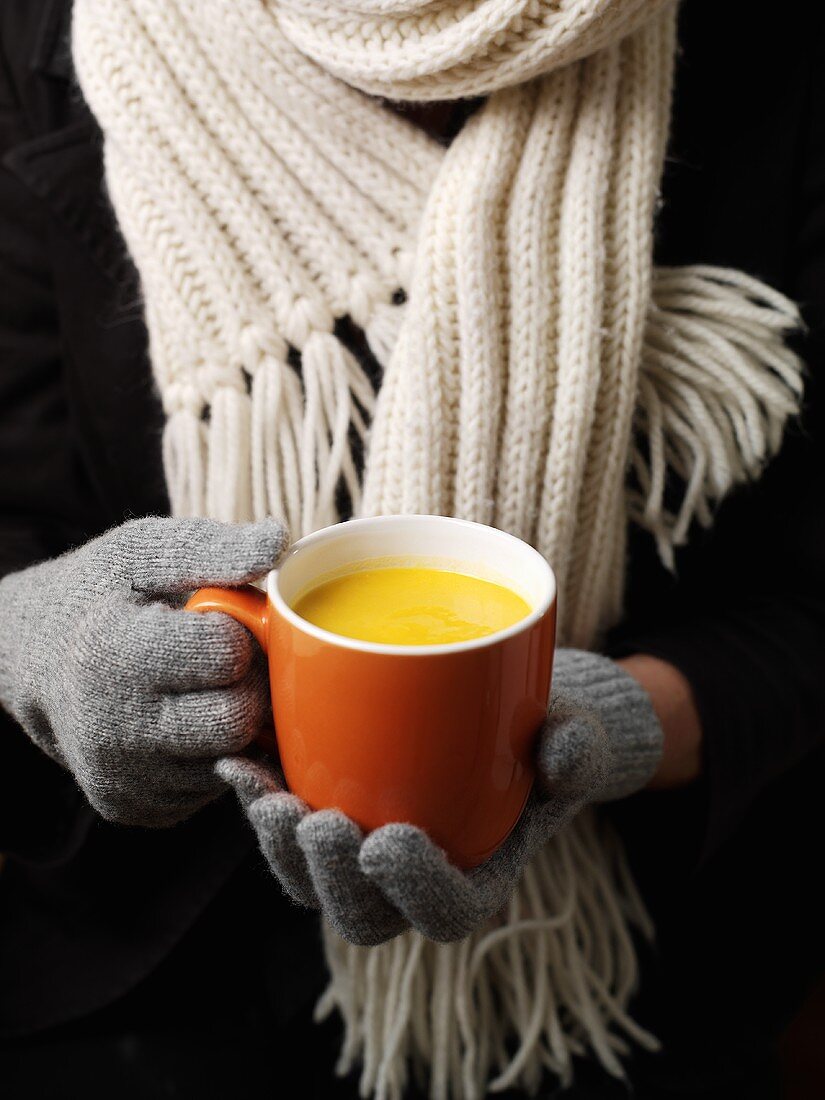 A cup of pumpkin soup