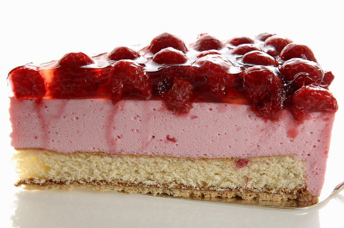A piece of raspberry cream cake