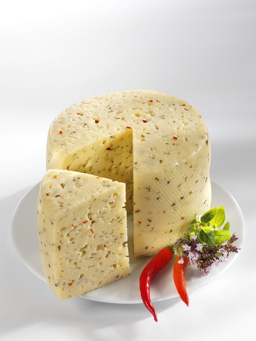 Tilsiter cheese with herbs and chilli