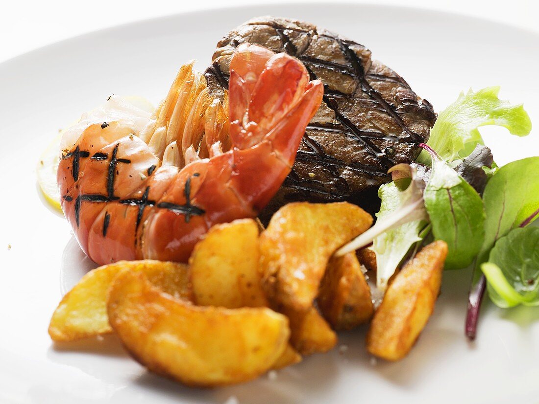 Grilled beef steak and shrimp with country potatoes