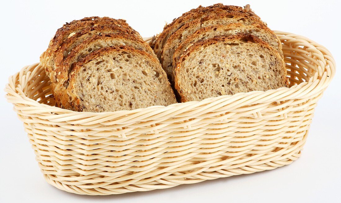 Sliced mixed-grain bread in a bread basket