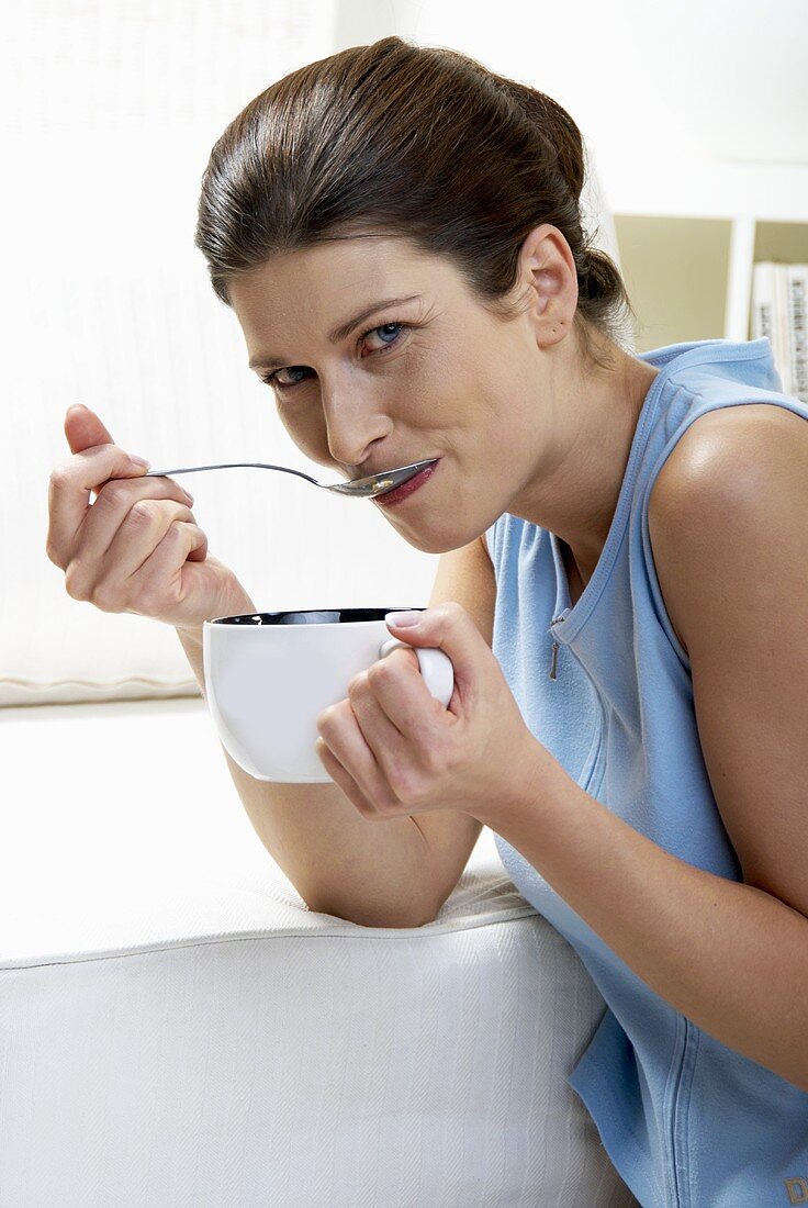 Woman eating muesli