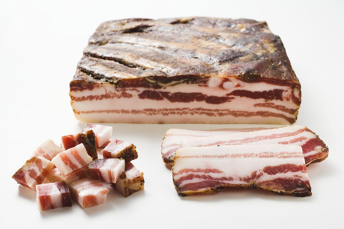 Smoked belly bacon, a piece, slices and diced