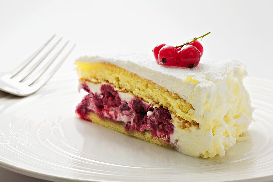 A piece of raspberry cream cake