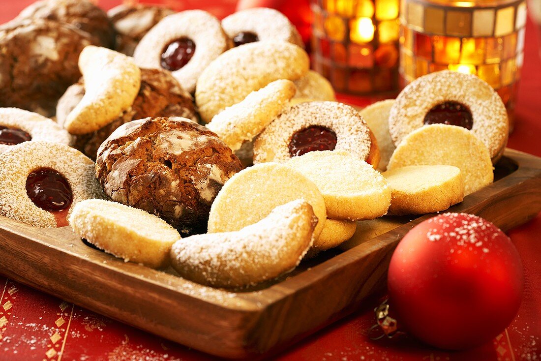 Assorted biscuits in a wooden tray