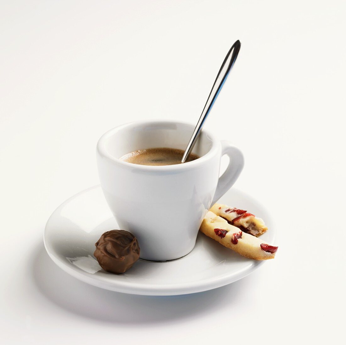 A double espresso with chocolate and pastry