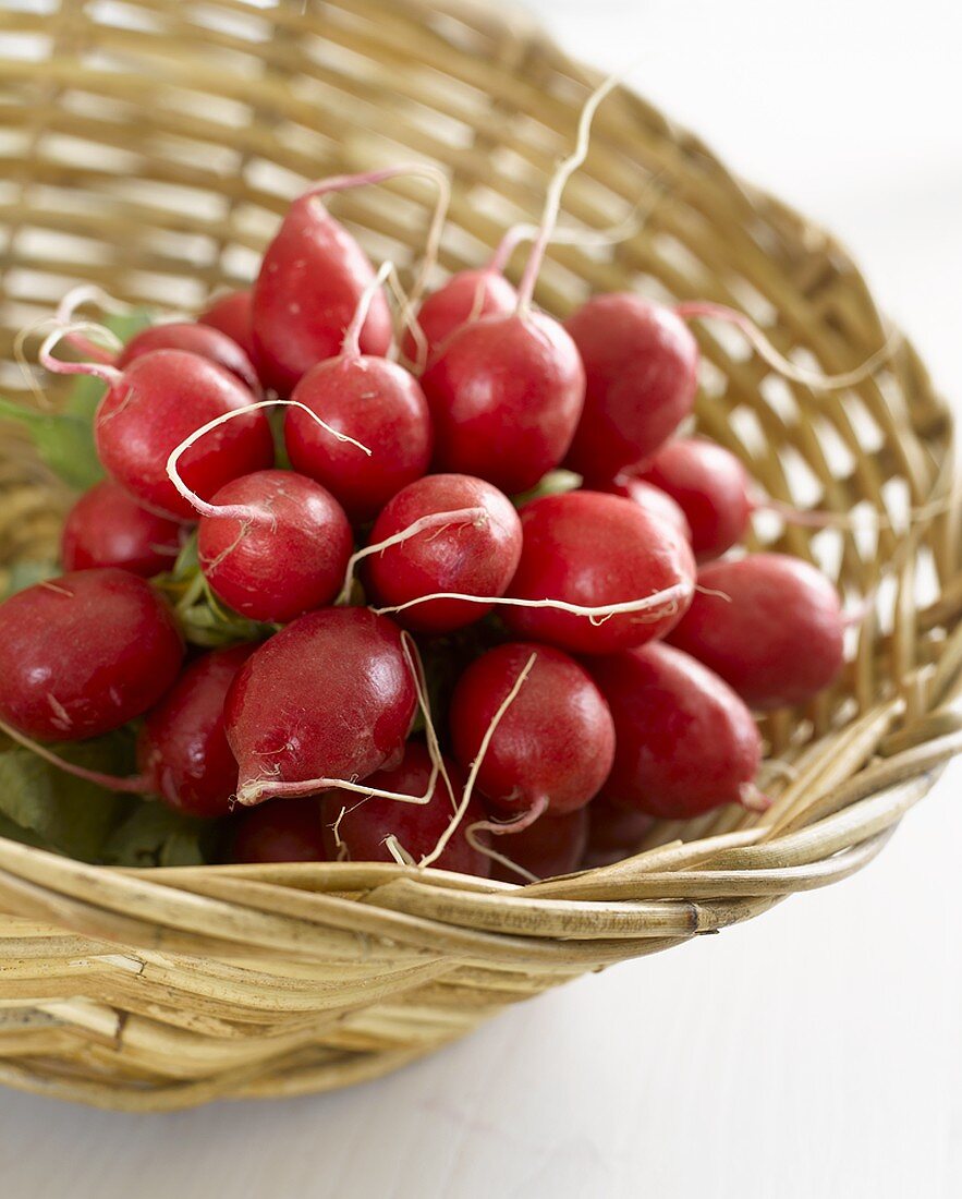 A bunch of radishes in a basket