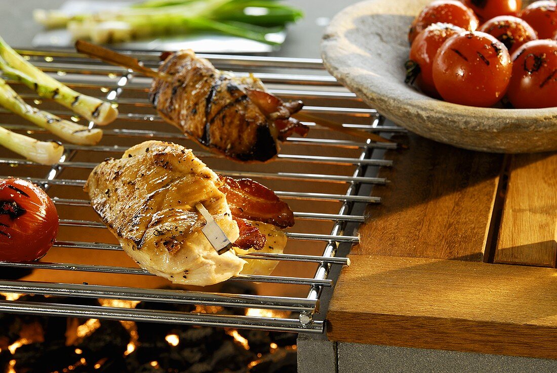 Chicken breast stuffed with cheese and bacon on barbecue