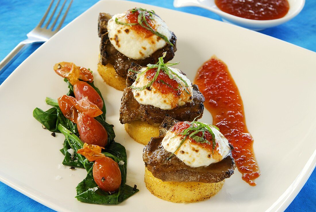 Potato cakes topped with buffalo medallions & goat's cheese