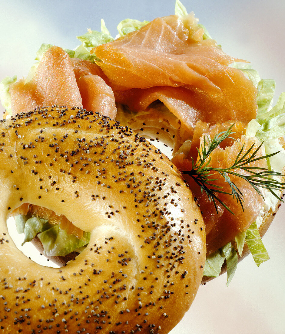 Poppy seed bagel filled with smoked salmon